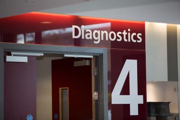 A hospital sign says diagnostics. 