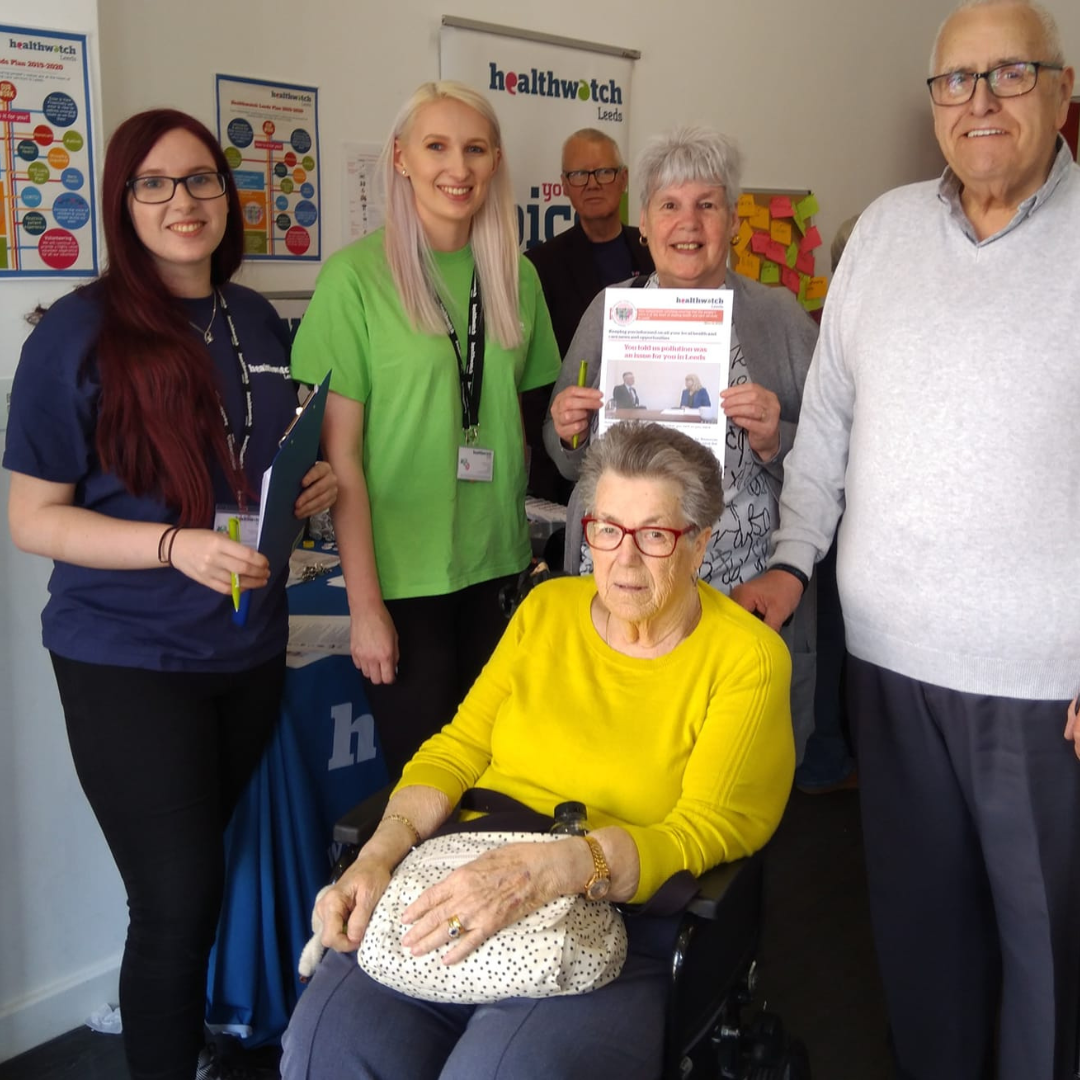 Volunteer Gina at Healthwatch Leeds with members of the public