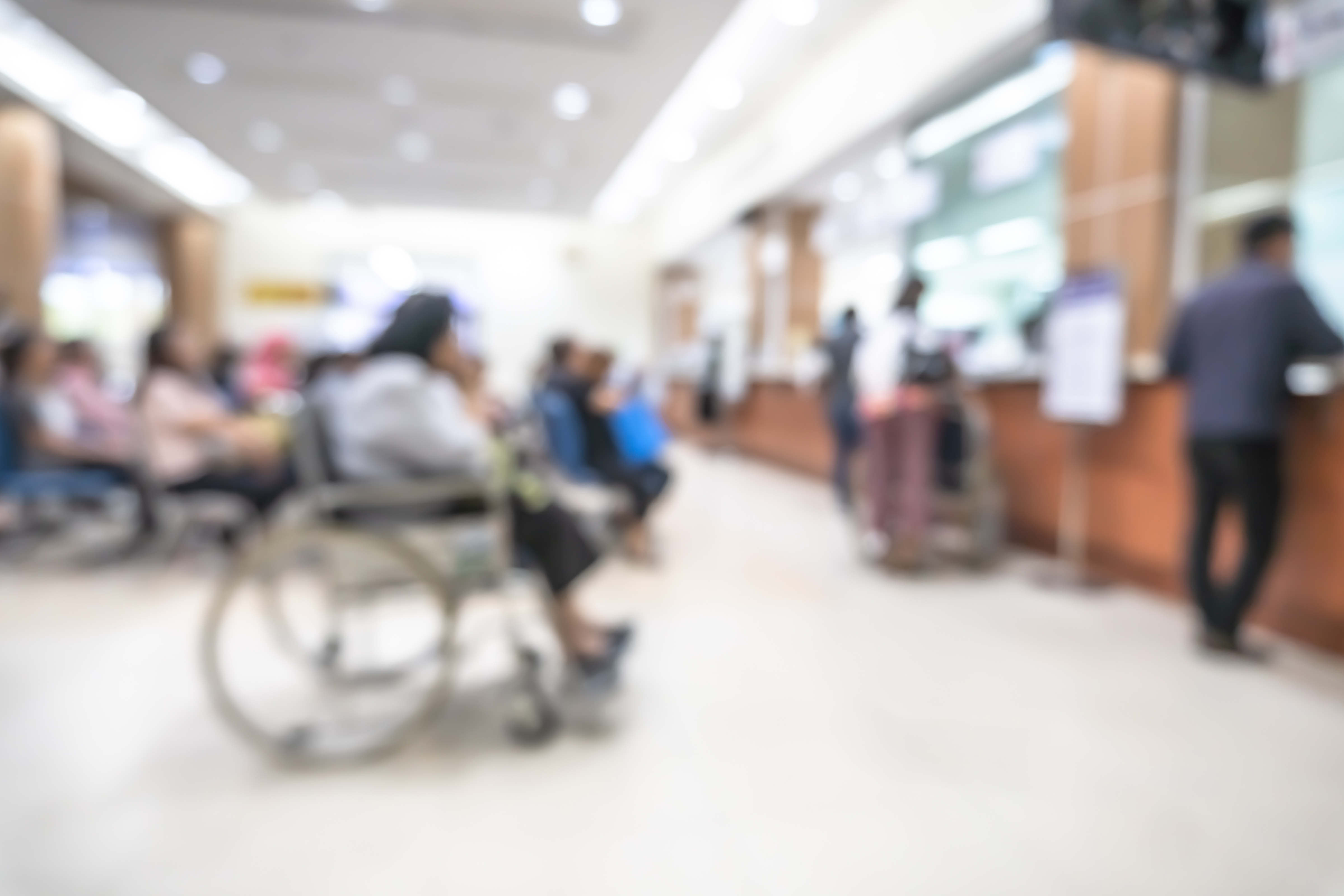 Medical blur background patient service counter, hospital lobby, cashier and pharmacy dispensary counter interior inside waiting hall area