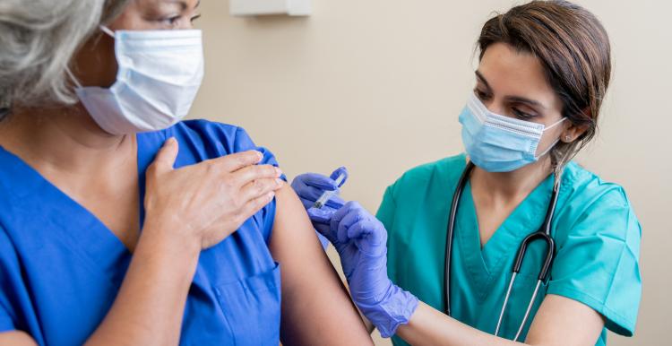 A woman getting her vaccine