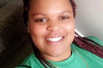 Woman wearing a green t-shirt