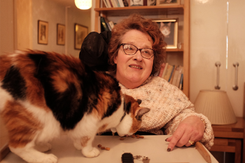 Photo of Angela with her cat