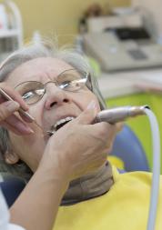 Elderly woman at the dentist
